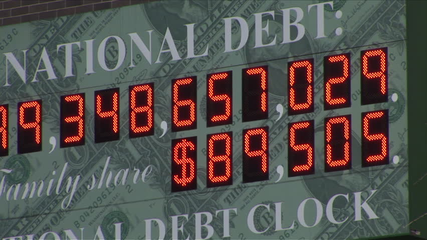 New York, NY - CIRCA March 2006: A close up of the American National Debt clock constantly rising, never going down. Poor America, she owes so much.