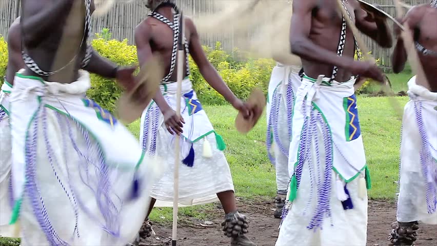 RWANDA, AFRICA - JUNE 16: Male Tribal Dancers Perform Traditional Intore Dance (traditional Ballet of Rwanda) on June 16, 20012 in Rwanda, Africa. Drumming, Song, and Music is featured as well.