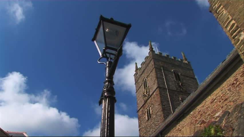 Upward view of a church tower on a sunny day