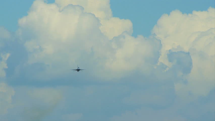 QUONSET, RHODE ISLAND - JUNE 2012: Air force F-16 Falcon flying towards camera and then going up at the Rhode Island National Guard Open House and Air Show in June 2012.