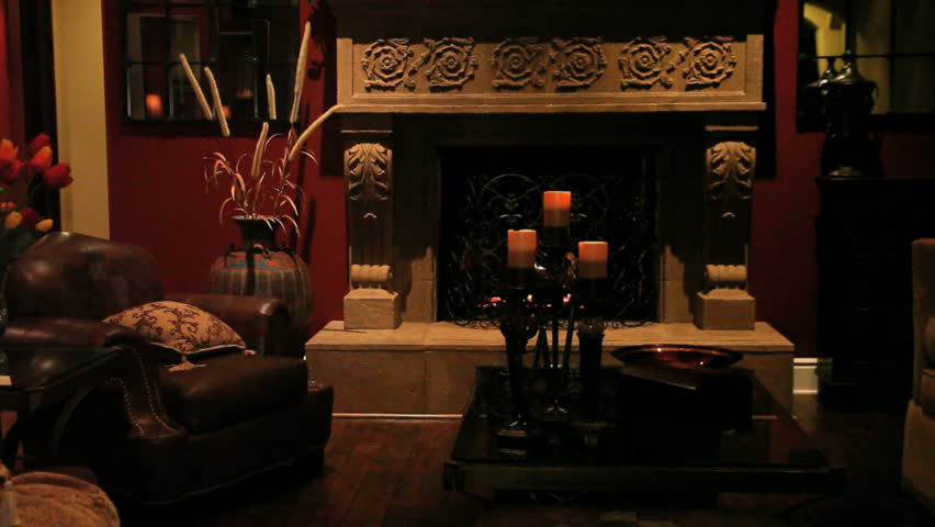 sitting room with candelabra and fireplace