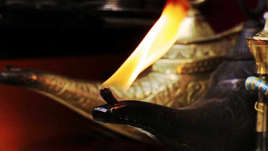 Magical Lamp of Aladdin. Arabic Oil Lamp with flames coming out of its nose.
