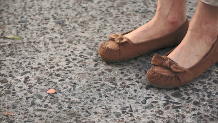 Woman Finding Lost Penny Coin on the Street