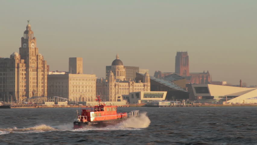 Liverpool pilot boat in the River Mersey passing the Liverpool skyline