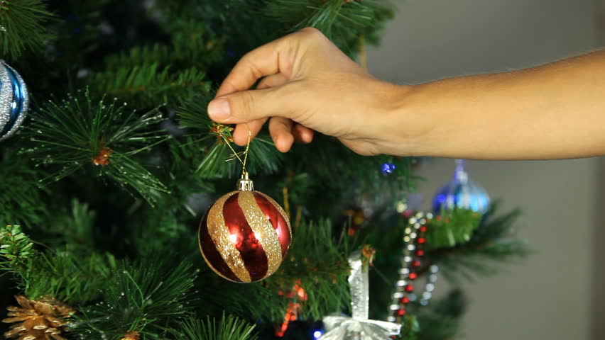 Decorating Christmas Tree, Putting Christmas Tree Balls in the Christmas Tree, Red Ball