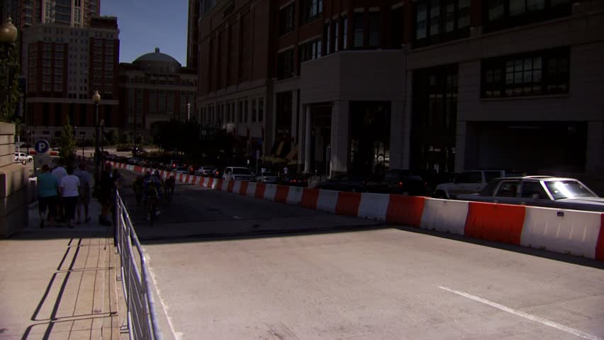 PROVIDENCE, RHODE ISLAND - SEPTEMBER 3, 2009: Bicycle racers passing camera on city street