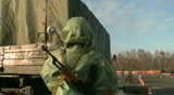 Soldiers disinfecting truck