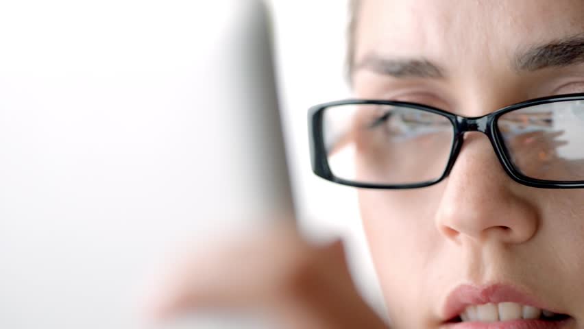 Attractive young woman usin tablet computer touch screen