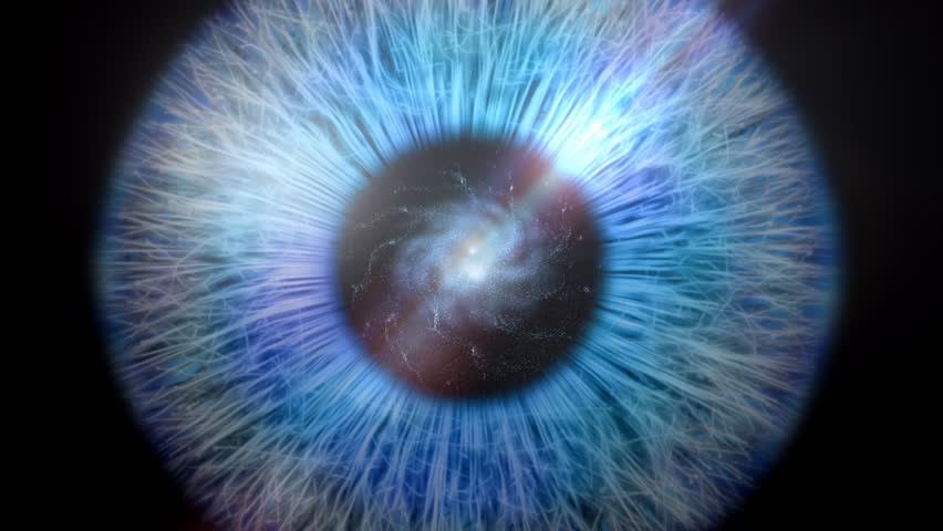 Slow zoom in to a galaxy of stars as the pupil of an eye.
