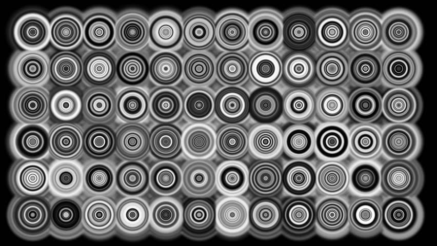Hypnotic or mesmerizing dots continually appearing. All different colors.