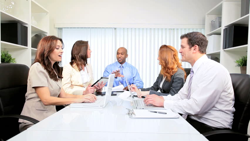 Ethnic advertising agency executive brainstorming ideas current promotion with staff team