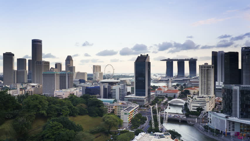 Elevated daytime view over the Entertainment district of Clarke Quay, the Singapore river and City Skyline
