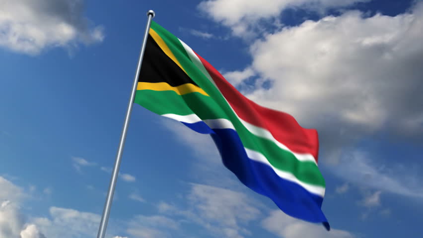 South African flag waving against time-lapse clouds background
