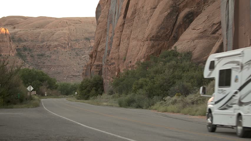 MOAB, UTAH - CIRCA SEPTEMBER 2011: RV motorhome passing camera near Moab, Utah