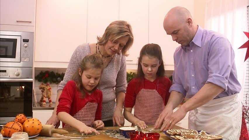 A family making gingerbread biscuits