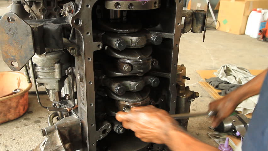 Repairing the engine.
