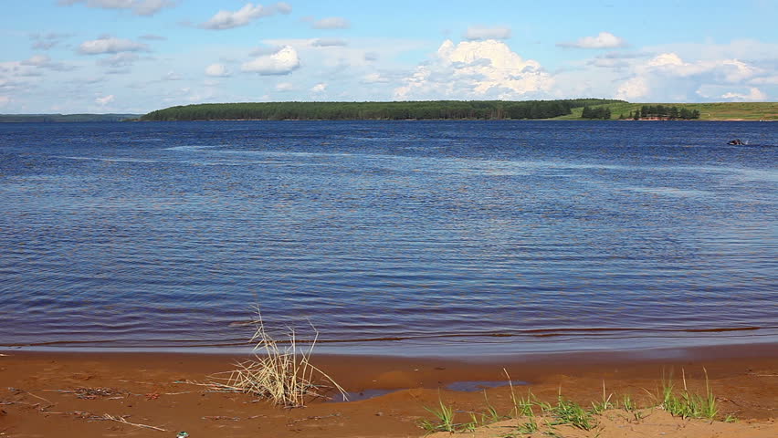 personal watercraft on lake in summer day