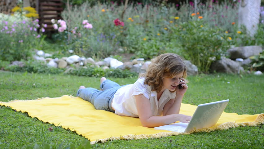 girl lies on a meadow