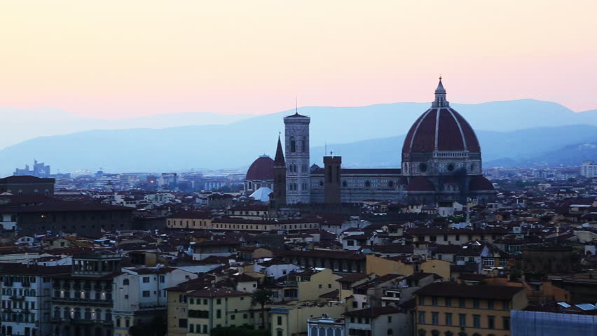 Pan shot of a city, Florence Cathedral, Ponte Vecchio, Arno River, Florence, Tuscany, Italy