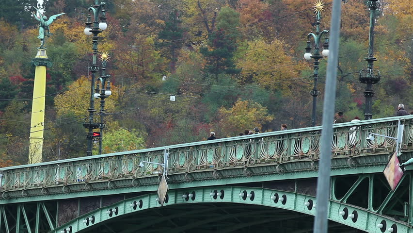 crowd of tourist  walk on Old bridge over vltava, prague