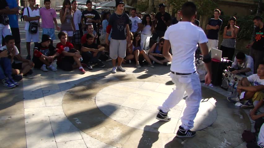 AVIGNON, FRANCE - OCT 1: 	Hip-Hop breakdancers compete in pairs, 	on the Plaza of the Palace of Popes, on Oct 1, 2011, in Avignon, France.
