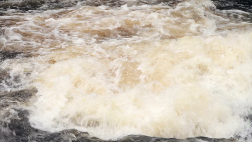Turbulent white river water rapids