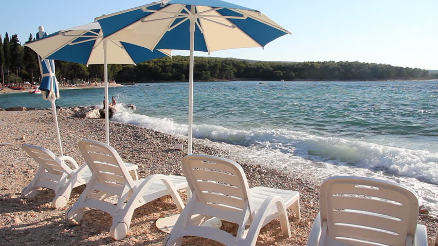 Sunbed and Parasol on the Beach