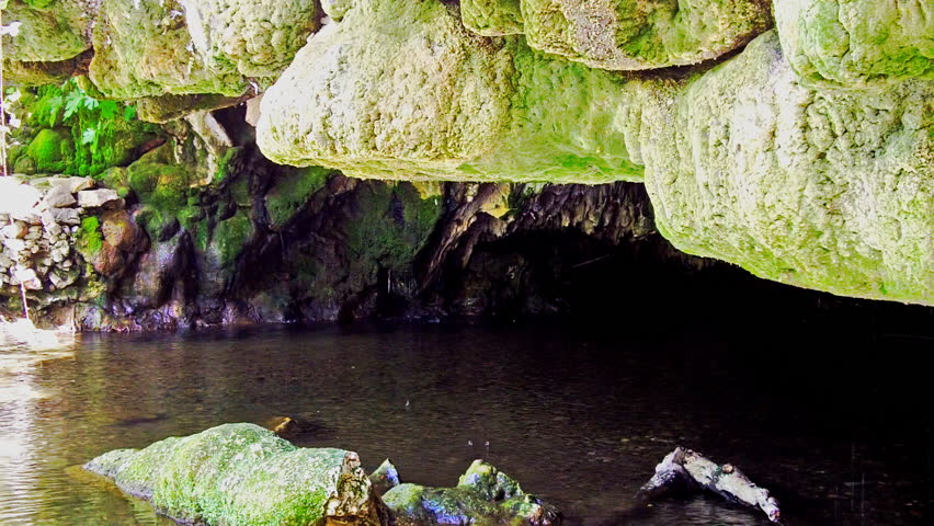 The opening or mouth of an underground river cave at Natural Bridges Hiking Trail near Columbia, CA. 