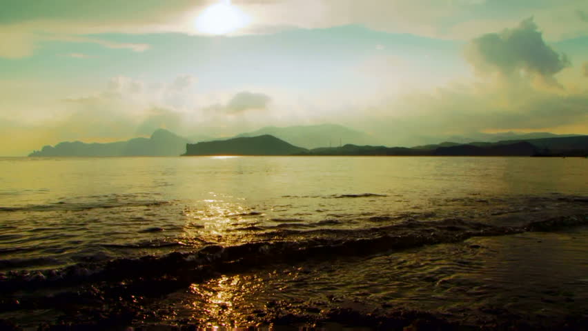 Beautiful water-scape and scooter sailing on the horizon.
Scooter in the sea.