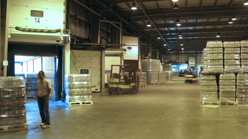 MOSCOW - MAY 31: (Timelapse View) Workers supervise shipment of containers with kvass at nonalcoholic plant Ochakovo, on May 31, 2012 in Moscow, Russia