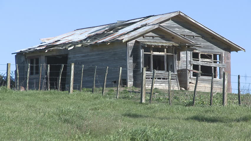Old and abandoned rural farm house