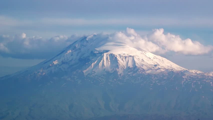 Legendary Ararat mountain, symbol of Armenia, covered by snow, time-lapse, with many clouds