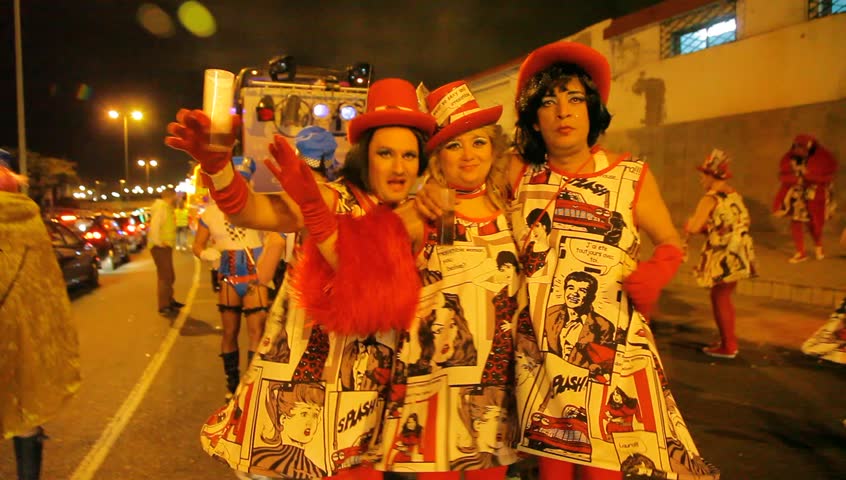 LAS PALMAS DE GRAN CANARIA, SPAIN - FEBRUARY 18: 200,000 masked revelers and a hundred or so festooned cars and floats in the Grande Parade (Gran Cabalgata ) of the Carnival February 18, 2012, Spain 