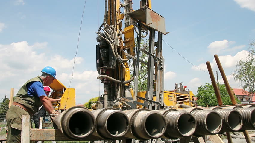 Workers operate a drilling rig for a Natural-gas. HD1080p. 