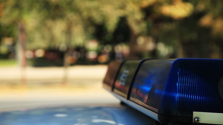 police car light with traffic