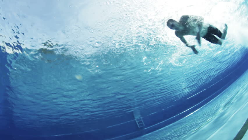 dynamic butterfly swimmer underwater view