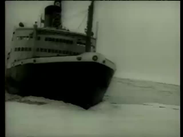 Canadian ship D'Iberville makes its way through frozen Saint Lawrence River for Montreal in Canada circa 1958-MGM PICTURES, UNIVERSAL-INTERNATIONAL NEWSREEL, USA, filmed in 1958