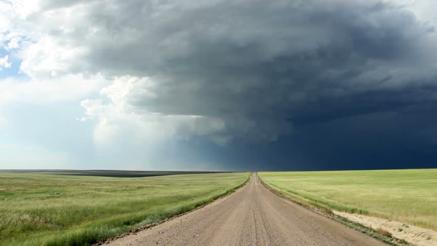 Driving towards a supercell thunderstorm in eastern Colorado. HD 1080p vehicle shot.