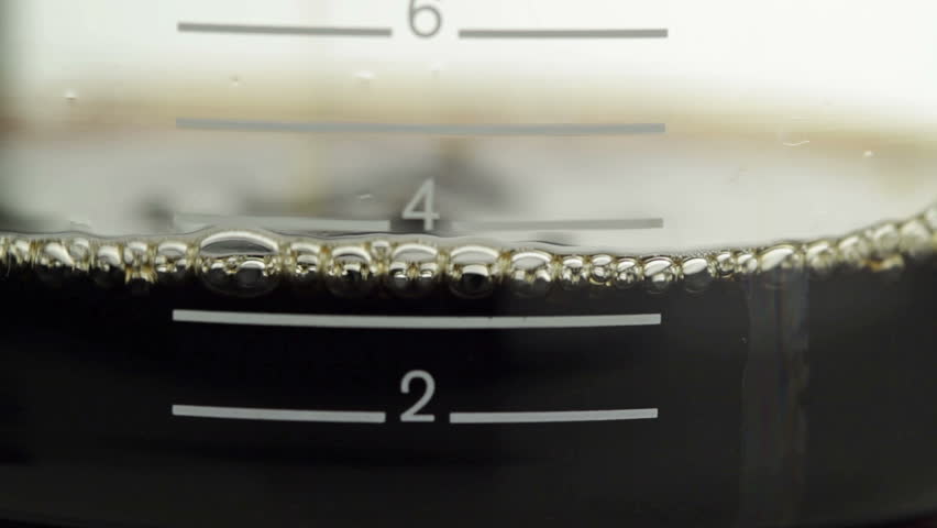 Coffeemaker, drops in the background - close-up