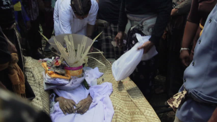 burning dead body in Balinese funeral, Bali, Indonesia