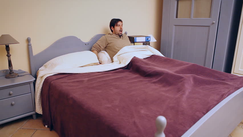 A sleeping man's reaction to something scary or annoying. See my other "
Ghost-themed clips for a complementary clip to add to this one. Suitable for horror, Halloween or Christmas scenes.