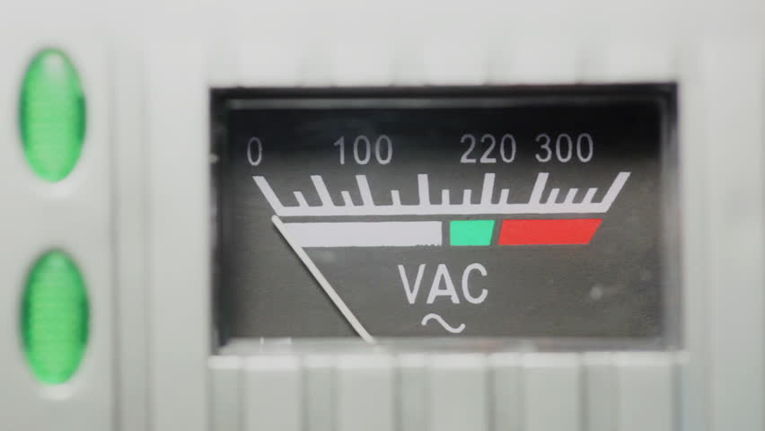 Vintage analog volt meter close up