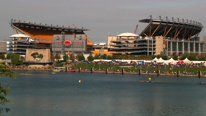 PITTSBURGH, PA - CIRCA OCTOBER 2009: Crew team members prepare and race in the Row Regatta on the Allegheny River on Pittsburgh's north shore.