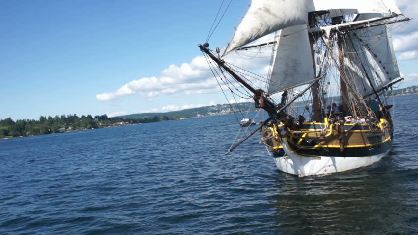 KIRKLAND, WASHINGTON - AUG 31 - 	Gunner  fires a cannon as the  Lady Washington sails by 	  during a mock sea battle as part of Labor Day festivities 	on Aug 31, 2012 near Kirkland , Washington.
