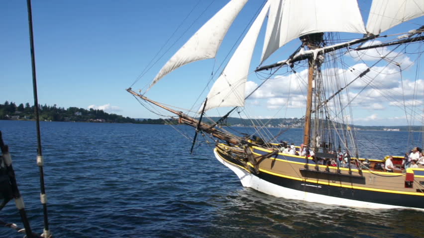 KIRKLAND, WASHINGTON - AUG 31 - 	Gunner  reloads a cannon on the  Lady Washington 	  during a mock sea battle as part of Labor Day festivities 	on Aug 31, 2012 near Kirkland , Washington.
