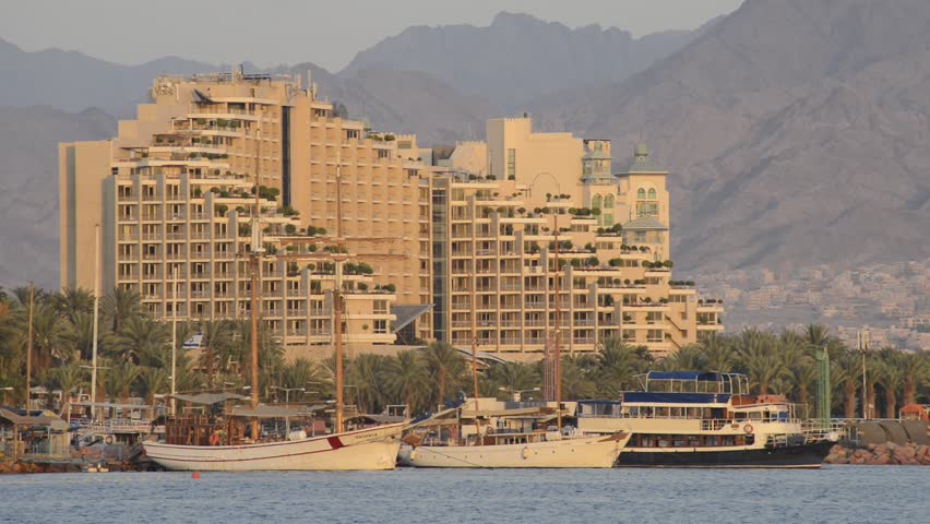 EILAT, ISRAEL - OCTOBER 26, 2012: Pleasure yachts near resort hotels in Eilat, October 26, 2012, Israel