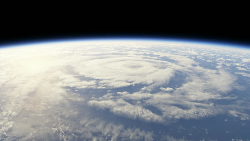 Hurricane seen from space, flying into storm