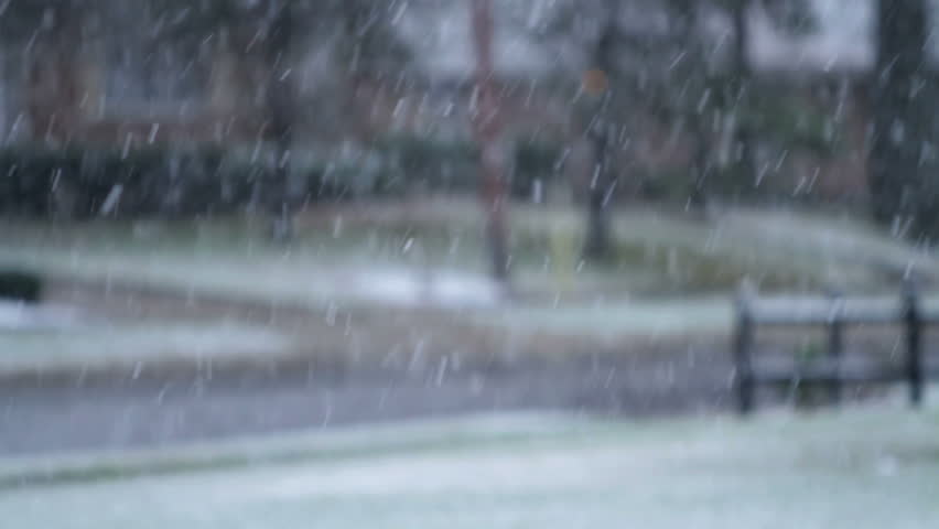 Car Driving on Icy and Snowy Road