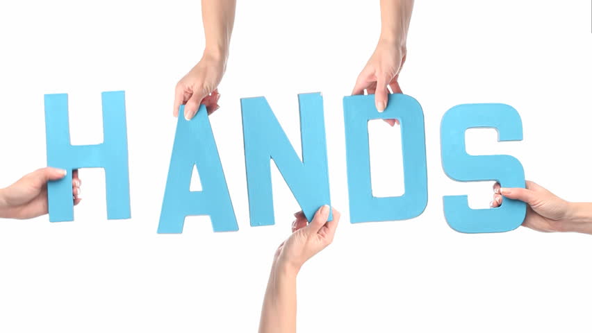 Female hands holding up HANDS letters