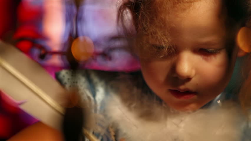 Girl writing with quill pen. Xmas concept
